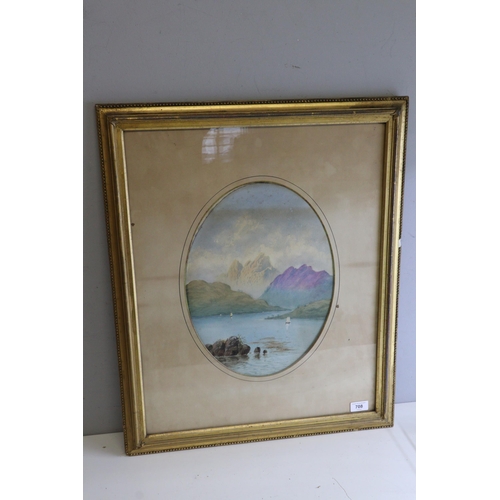 493 - Framed watercolour of moutains and a lake.
