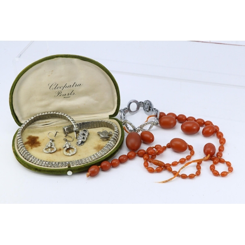 47 - An amber necklace examine together with a paste necklace, earrings and other pieces