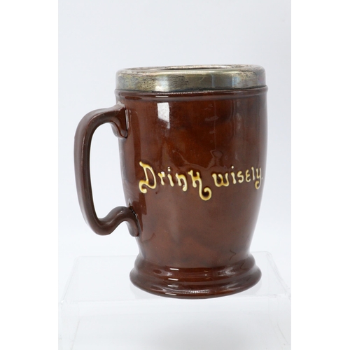 143 - Royal Doulton Kingsware silver topped tankard with 