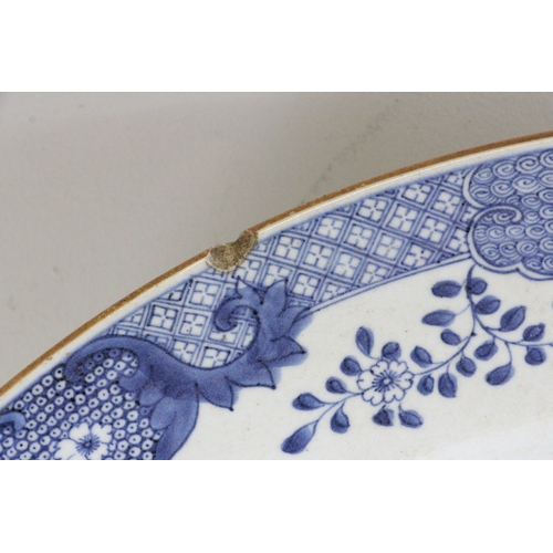 461 - A large chinese blue and white charger/plate (approx. 55cm diameter) noted hairline cracks to the ed... 