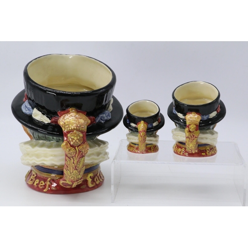 334a - Royal Doulton Beefeater together with two smaller versions