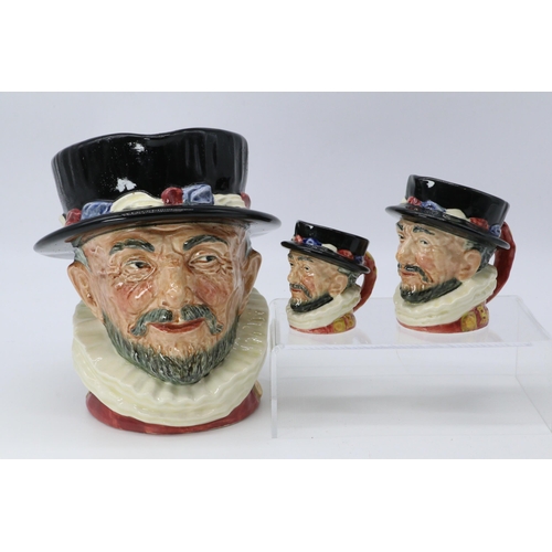 334a - Royal Doulton Beefeater together with two smaller versions