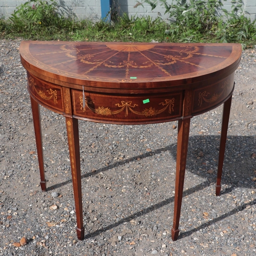 279 - Antique d shaped mahogany and inlaid card table with adams style vase inlay.