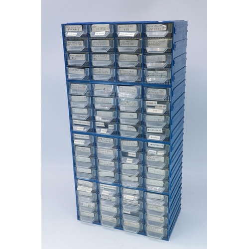 392 - Plastic storage drawers full of watch repair items, Lots of movements etc