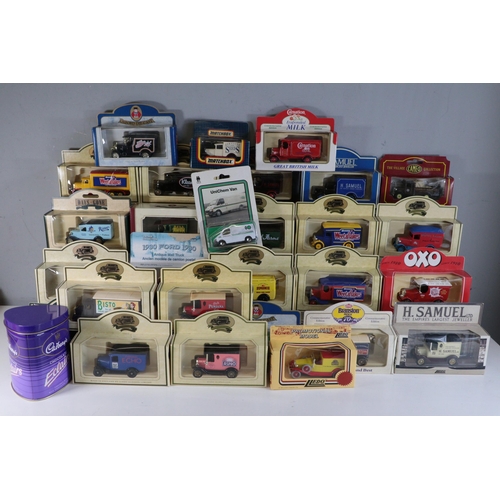 428 - A good selection of boxed diecast vehicles, promotional models including Kleenex, Bassetts All-Sorts... 