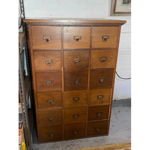 635 - An 18 drawer haberdashery style unit will require a new back and some of the drawers have evidence o... 