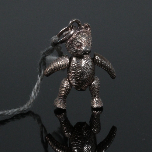 27a - Sterling silver, jointed miniature teddy bear, Approx. 4.6g, measures approx. 2.5cm