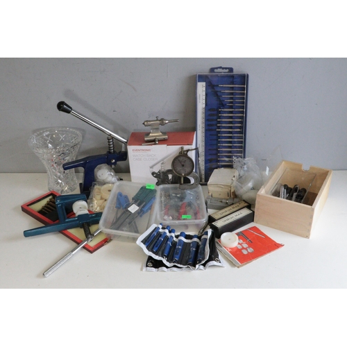 622 - A selection of tools relating to watch making and repairing including watch back and case closer, du... 