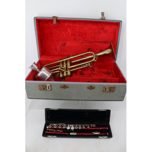 36 - Cased trumpet and a cased flute