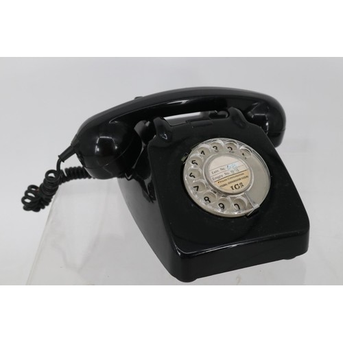 55 - A vintage black dial up telephone together with various collectables to include vintage texet radio,... 