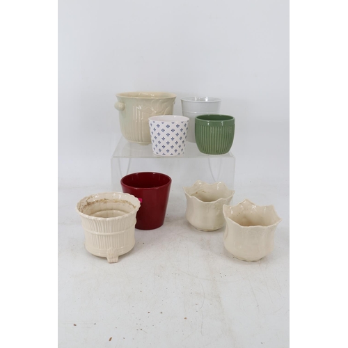 61 - Selection of ceramic small plant pots.