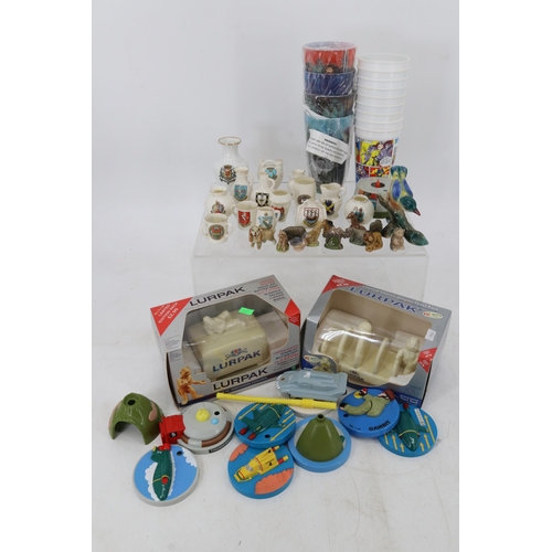 84 - Selection of Lurpak collectables, wade whimsies, crested ware, selection of boxed toys and movie cup... 