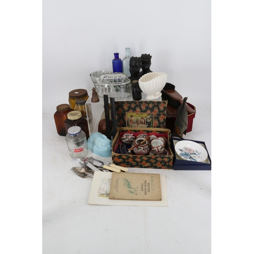 90 - Selection of general items to include dolls, childs teaset, enamel trinket pot, glass, carved bust, ... 