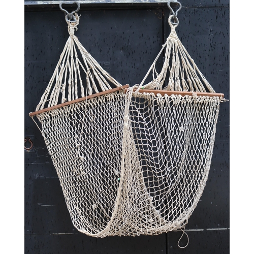 94 - A vintage hammock with hooks