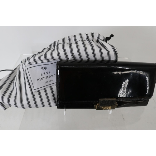 134 - Anya Hindmarch patent leather purse in dust bag together with a branded bag with dust bag (inspect) ... 