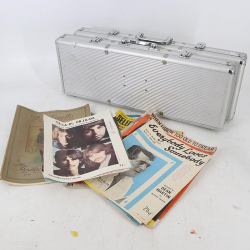 207 - A selection of sheet music and two aluminium cases inside Lot 201