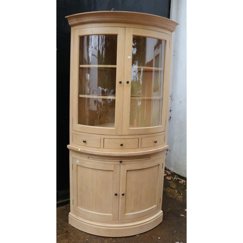 226 - Neptune Oak corner cabinet measuring approx 74cm x 74cm Height 210cm Top half glazed unit with shelv... 