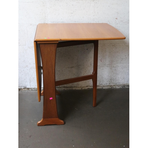 295 - Legate furniture drop leaf table measuring approx 75cm Wide x 123cm extended.