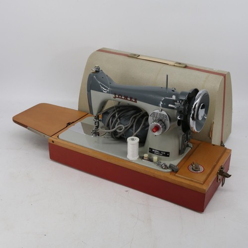 320 - A Jones electric sewing machine model 104 (trade, spare and repairs) together with a SilverCrest 6-i... 