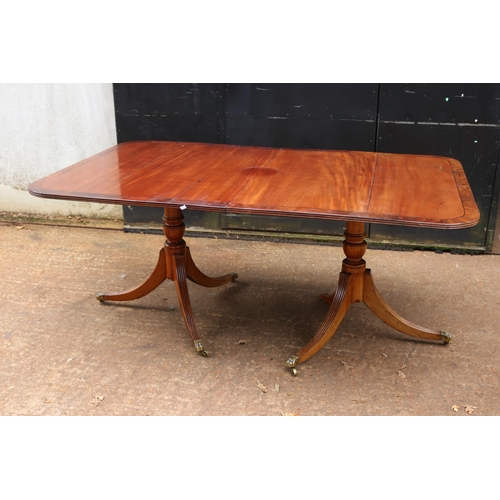 361 - Mahogany dining table on twin pedestal one foot is broken (inspect)measuring approx 102cm w x 170cm ... 