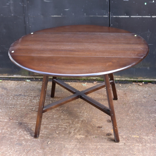 419 - Dark Ercol drop leaf table measuring approx when extended 113cm w x 123cm h