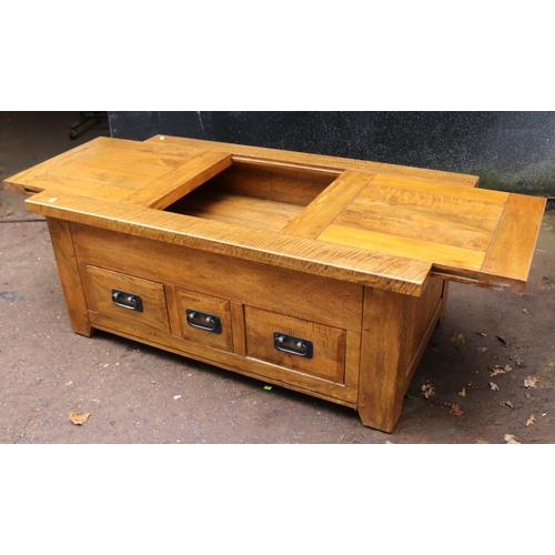 464 - Modern mango wood coffee table with 3 drawers with opening top measuring approx 121cm x 70cm x 51cm