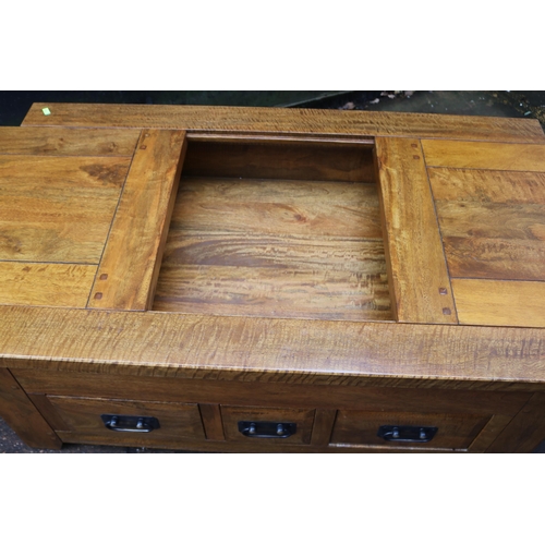 464 - Modern mango wood coffee table with 3 drawers with opening top measuring approx 121cm x 70cm x 51cm