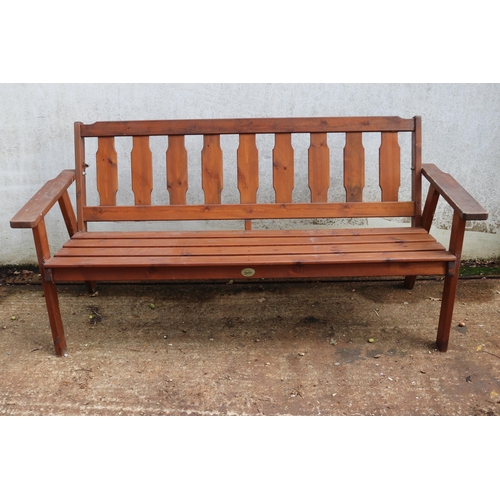 471 - A Harbo of Sweden garden bench measuring 168cm approx' with cushions .