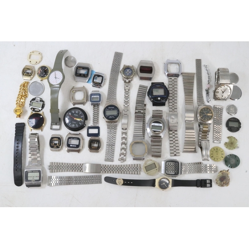 12 - A quantity of assorted digital watch parts