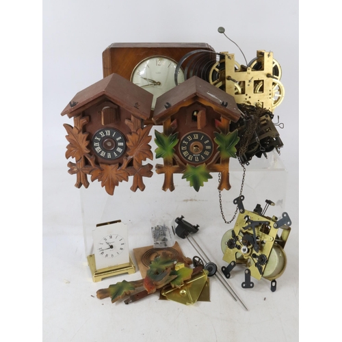 29 - Three boxes of assorted mantle clocks, spares, cuckoo clocks etc (all spares)