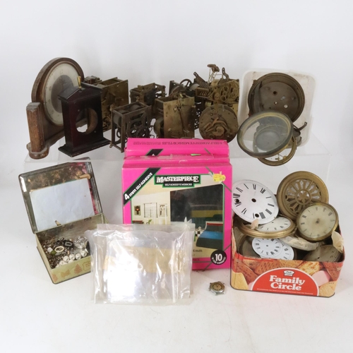 48 - Two boxes of assorted mantle clock parts deemed for spares only