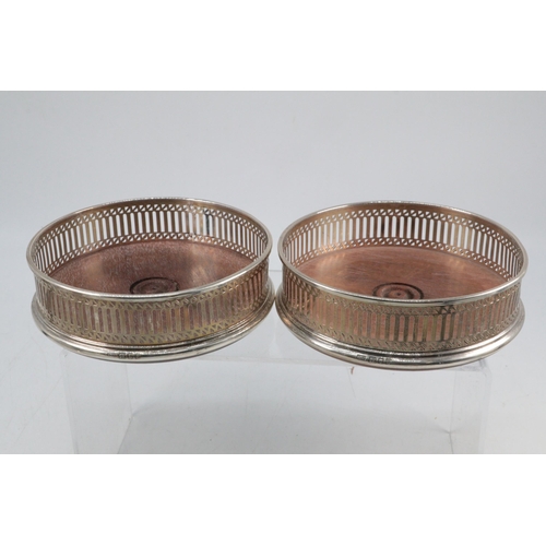 31 - Pair of Silver hallmarked bottle coasters