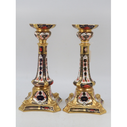 5 - Pair of Crown Derby 1128 Imari patterned candlesticks, approx. 26.5cm high
