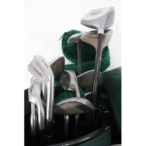 18 - Assortment of golf clubs (Ping, Wilson etc) in golf bag together with a Howson cart.