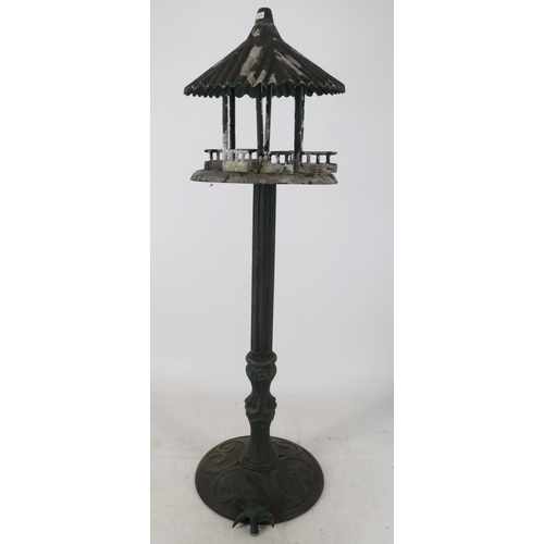 20 - Cast metal bird house measures approx 110cm tall