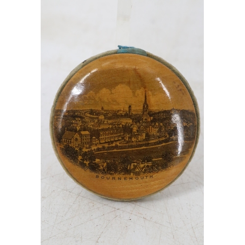 32 - Three items of Mauchline ware featuring views of Bournemouth and a distressed wooden box.