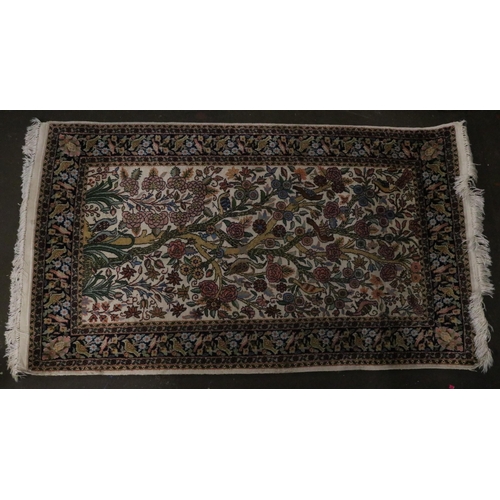 368 - Oriental style rug measuring 168cm x 89cm