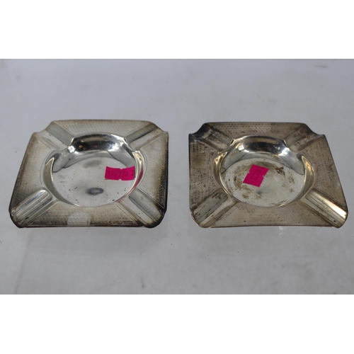 41A - A pair of continental silver ashtrays.