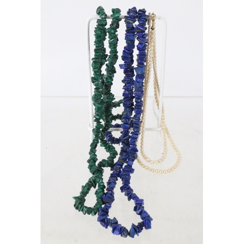 43C - Two Seed pearl necklaces with a malachite necklace and one other