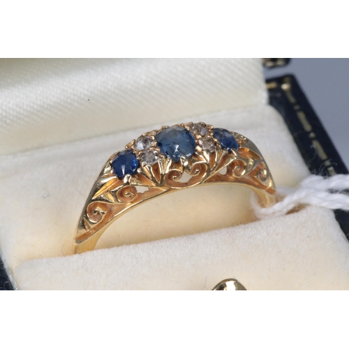 26 - 18ct gold diamond and sapphire ring. Weight approx. 3.9g size approx. N