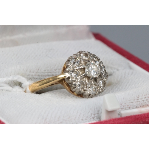 32 - 18ct Gold ring set with centre diamond surrounded by smaller diamonds. ring size approx. N weight ap... 