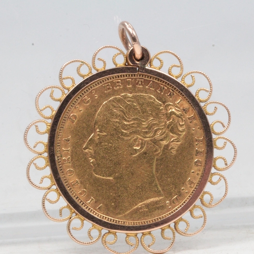 38 - Full gold 1873 Sovereign in 9ct gold mount. Overall weight approx. 9.9g