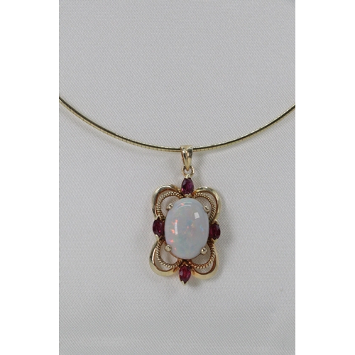 44 - 9ct gold necklace and opal and ruby pendant. Overall weight approx. 9g