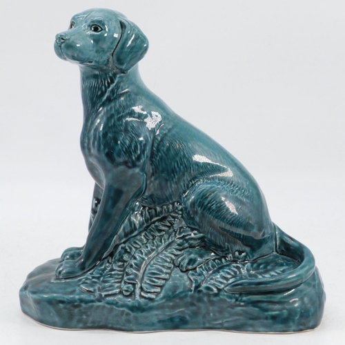 147 - Poole Pottery  blue glazed seated dog (approx. 20cm tall)