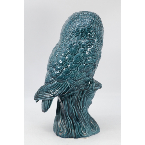 192 - A large Poole Pottery blue glazed Owl perched on log (approx. height 33cm)