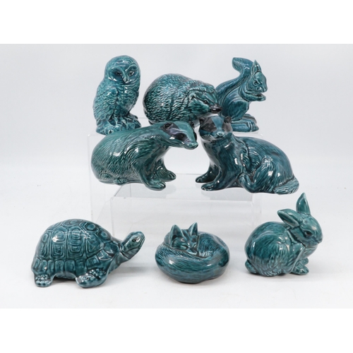 234 - A selection of Poole Pottery blue glazed animals to include two badgers, hedgehog, tortoise, fox, ra... 