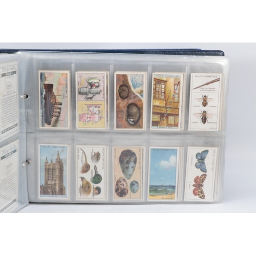 267 - Two binders containing complete sets of pre-war cigarette cards by various makers.  Also, five sets ... 