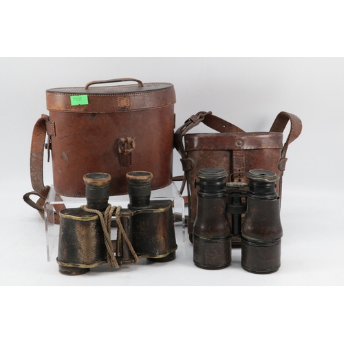 296 - Marine/Field/Theatre adjustable binoculars together with another vintage pair (both a/f and in leath... 