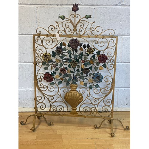 299 - Gold painted metal fire guard, decorated with raised metal formed floral roses height approx. 93cm