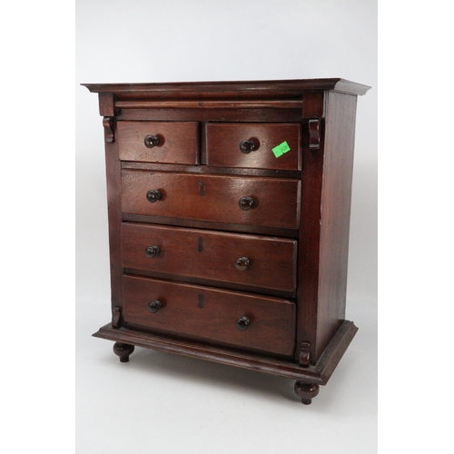 396 - Mahogany antique apprentice chest two over three drawers. Height approx. 44cms